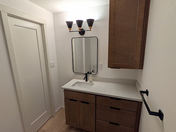 This is a private bathroom for Unit 4 only. It is not attached to the room, but it is in the hallway outside the bedroom door.