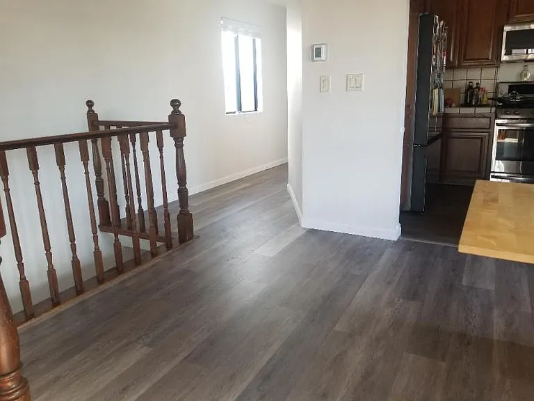 Upstairs hallway past kitchen.