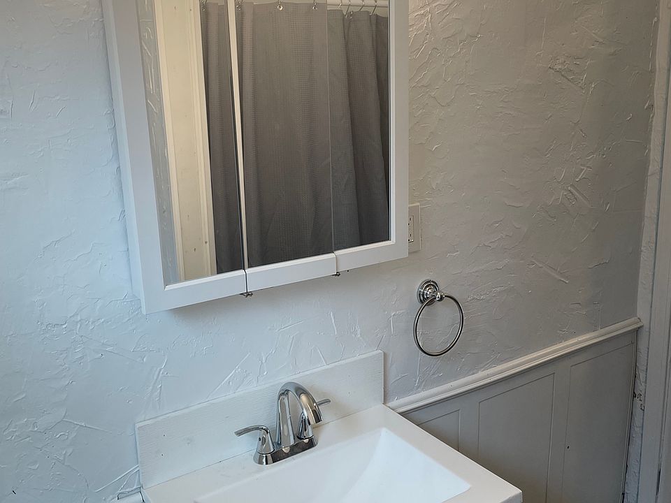 New Bathroom with LED lighting, new 3 panel medicine cabinet, new sink vanity, new 50 inch shower.