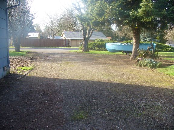 Large Driveway With a Second Side Turn around or Parking