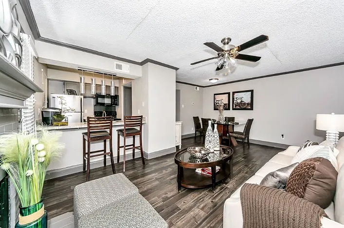 Spacious open-concept living rooms with modern finishes and natural light.