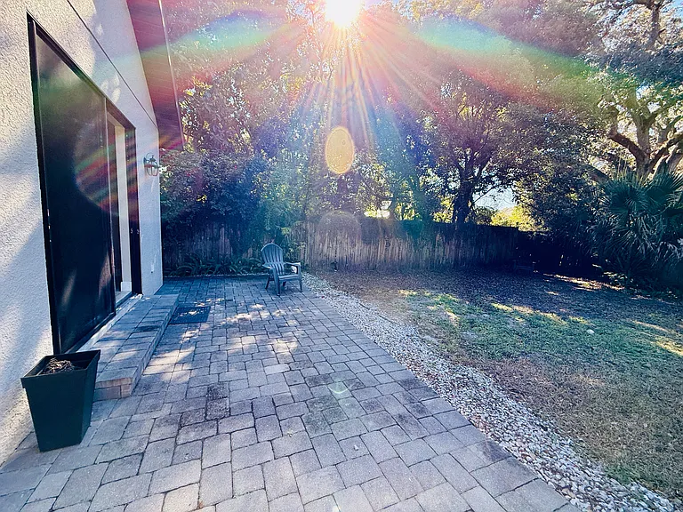Big Fence in Back Yard house paved all around