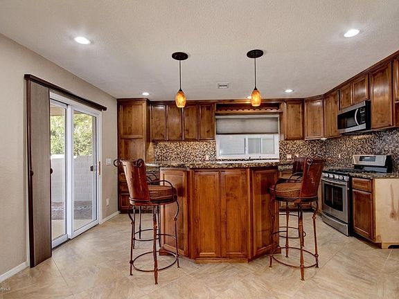 5th image of 7094 W Hunnington Dr
