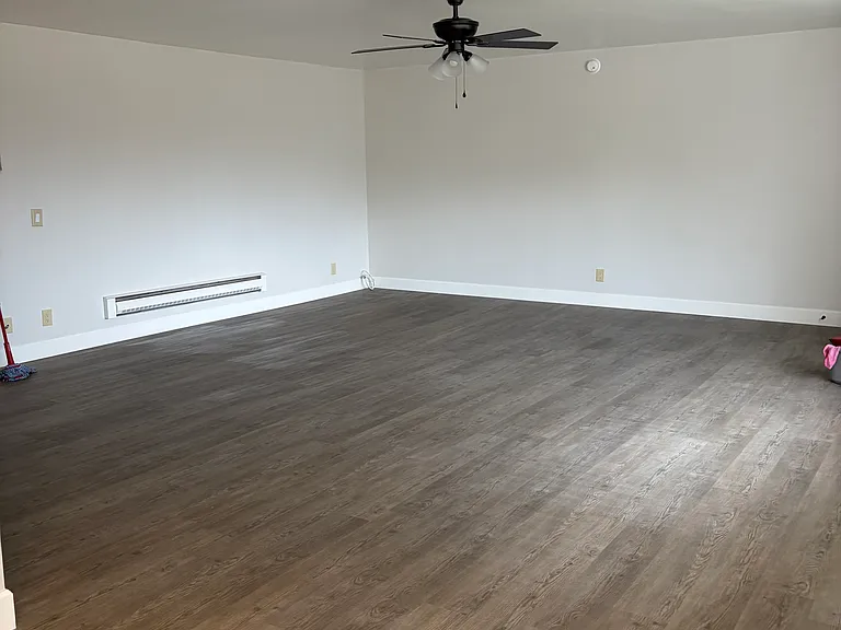 Large family room with smooth ceilings
