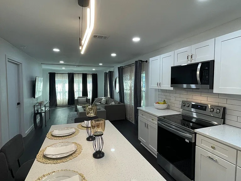 Open floor plan with island seating up to 4.