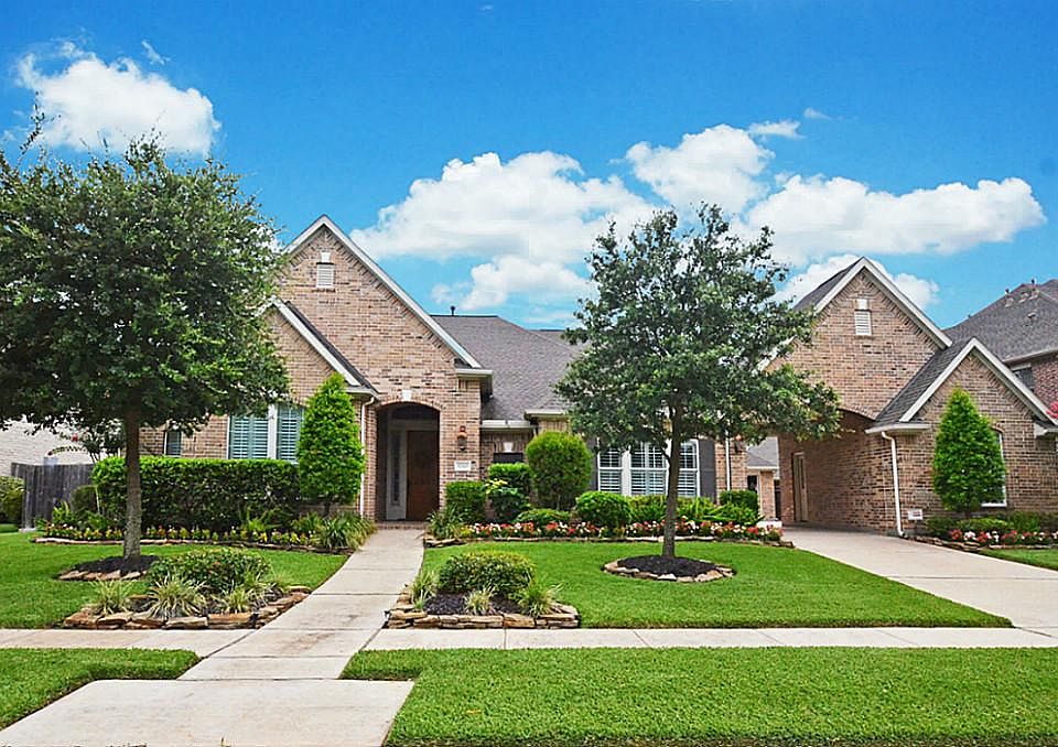 Pristine curb appeal doesn't even begin to describe the overwhelming beauty you will find in this am
