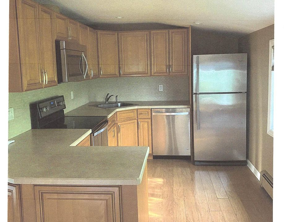 Kitchen is well lit with large eastern exposure window that fills the kitchen with natural light all day. New recessed ceiling high hat lights, flood the kitchen during the darker hours. Appliances and wood floor are four years new.