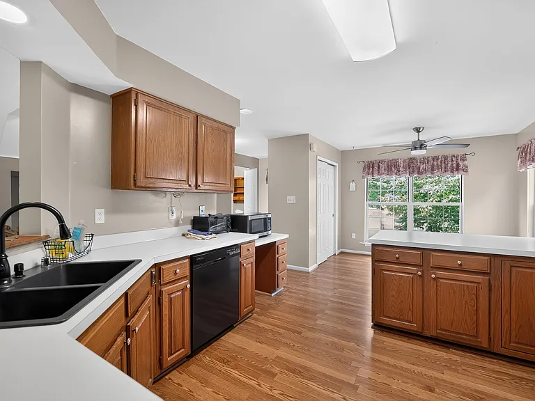Kitchen facing large windows in the kitchen