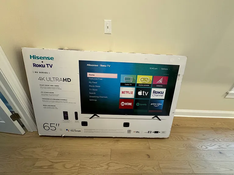 flat screen tv wall mounted in bedroom
