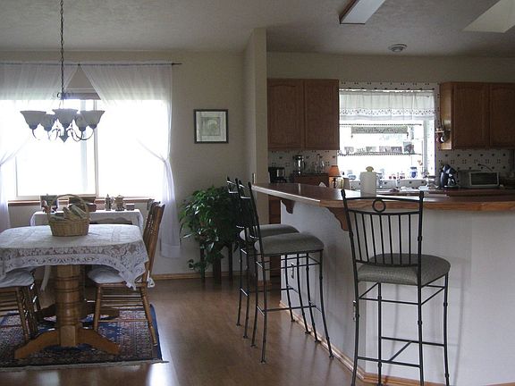 Dining Room, Open Kitchen and wrap-around bar