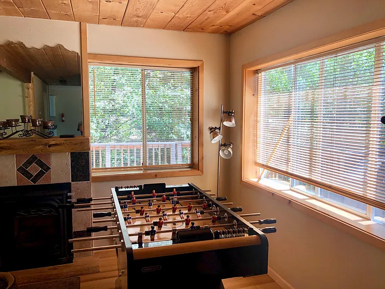 Foosball table, can also fit a dining table or desk here