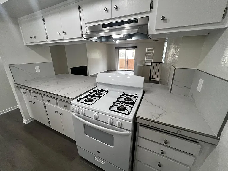 Calacatta porcelain kitchen.