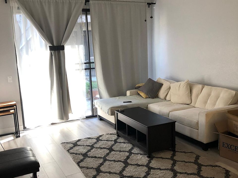 Living room with large sliding doors and ample light.