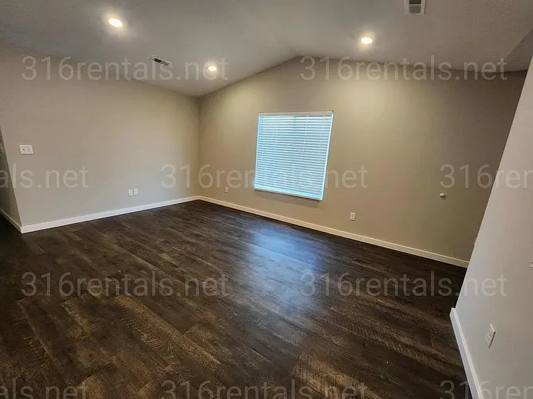 1813 E 69th Ct N — Photo 1