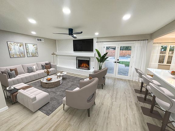 Open concept Living, kitchen and dining that flows out to the beautiful backyard!