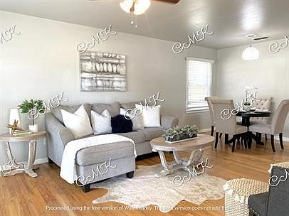 Charming Open Concept Livingroom and Dining Room. The home is leased unfurnished.