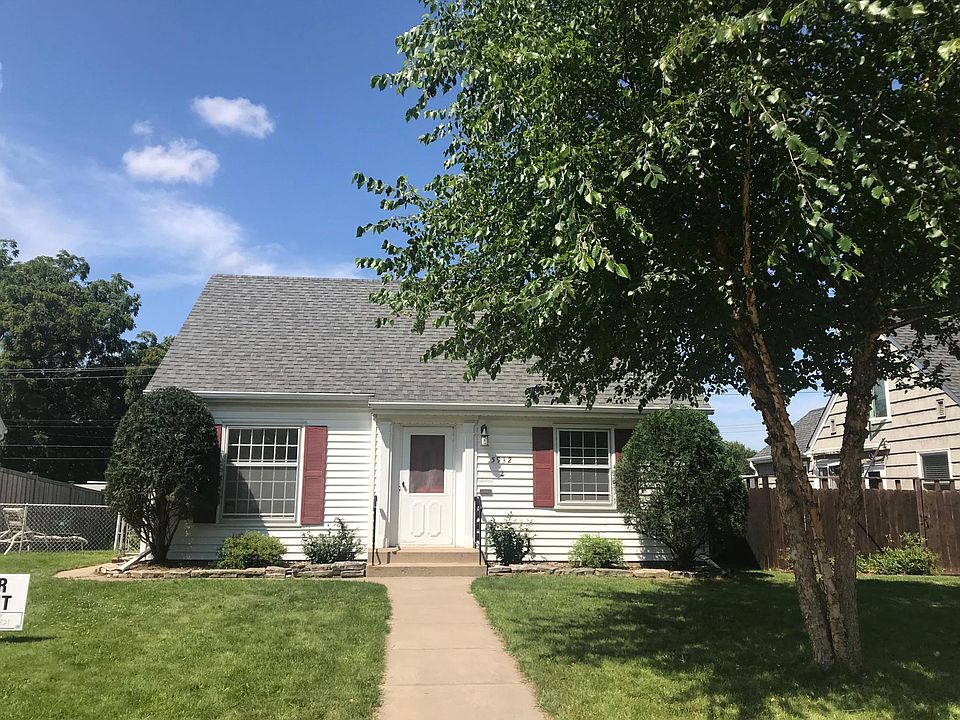 Front of House with River Birch Clump.