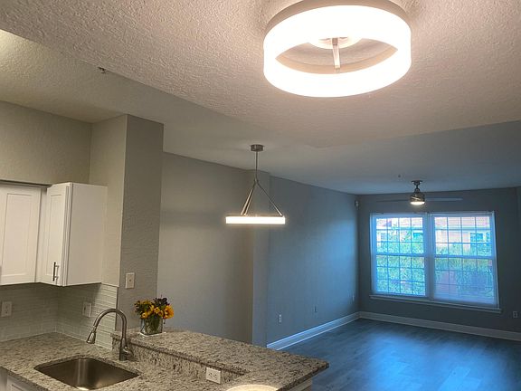 Ample space for dining and living. Plus there's plenty of room to add a couple of barstools.