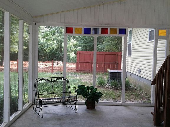 Pleasant Patio with Stained Glass Accent.