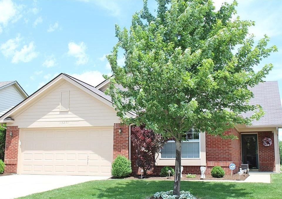 Superb curb appeal with this brick ranch home located on golf course lot