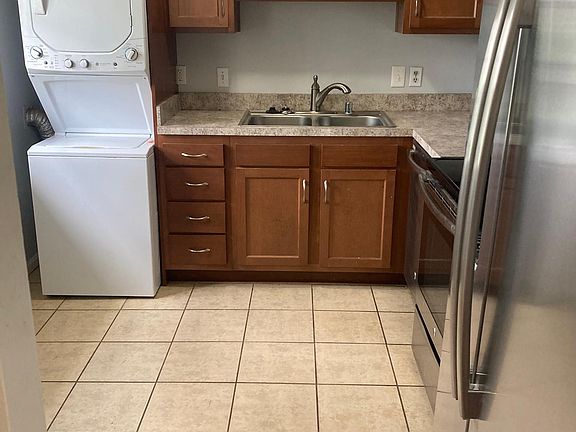 Includes stack washer and dryer