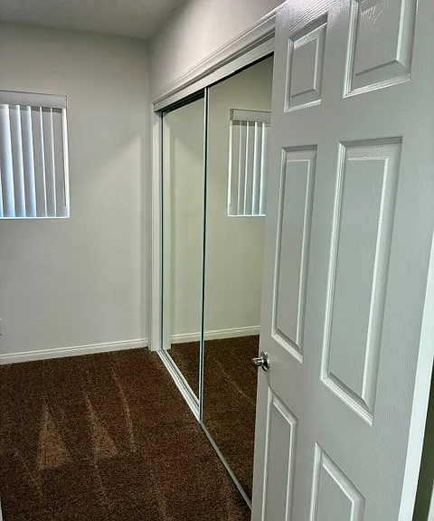 Primary Bedroom #2 also Featuring Mirrored Closet Doors