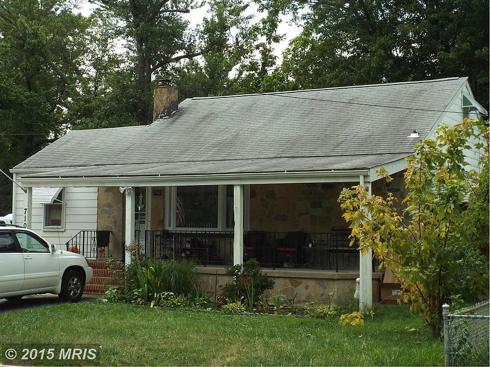 Stone and siding front with full covered porch