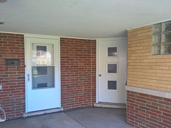 Front door, laundry room door on right