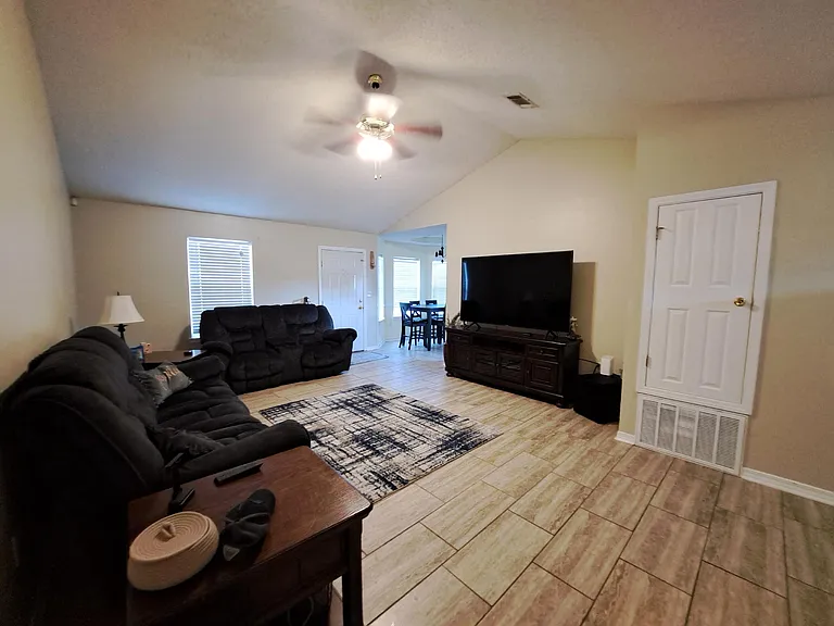Living area has new tiled flooring