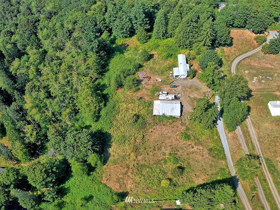 Beautiful Fobes Hill. Value in land.  No value in existing 1977 single wide.  