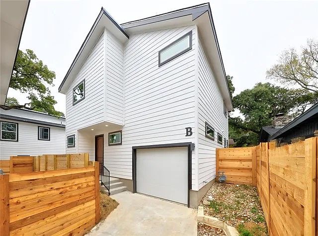 Stand-alone detached home with private entrance and fenced yard