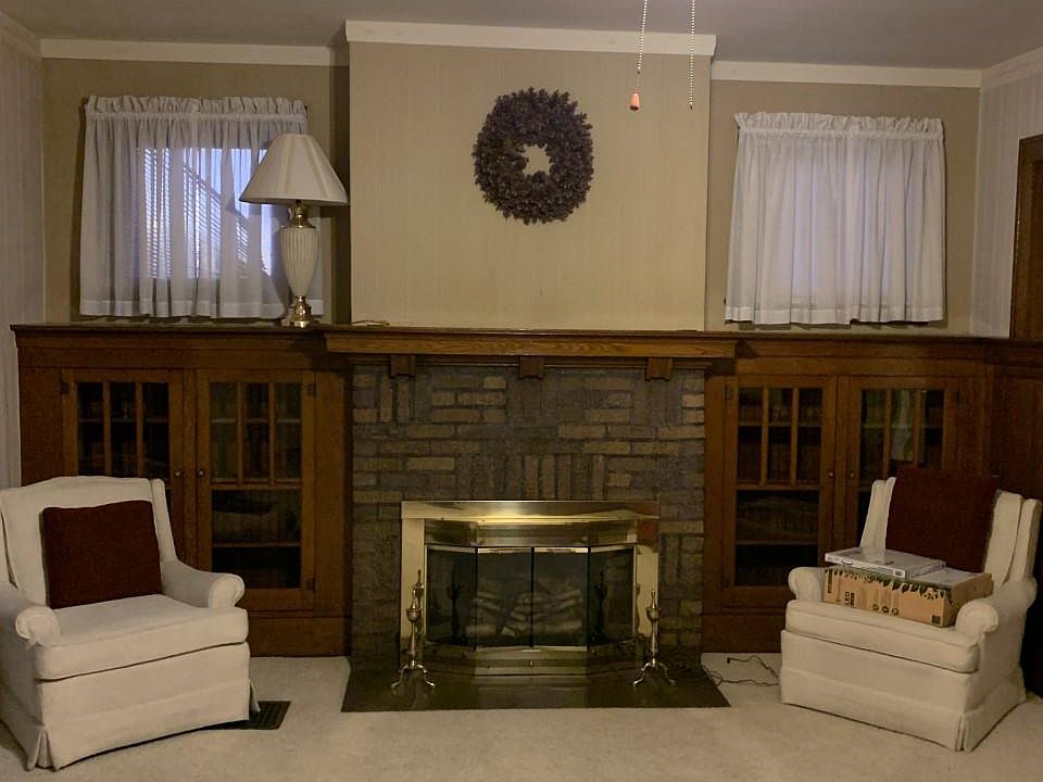 Living room fireplace, wood and glass built ins