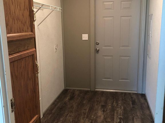 Laundry room with back door