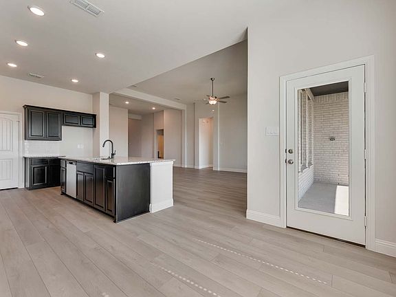 Fairhaven floor plan by Pacesetter Homes showcasing a spacious one-story layout with open-concept li