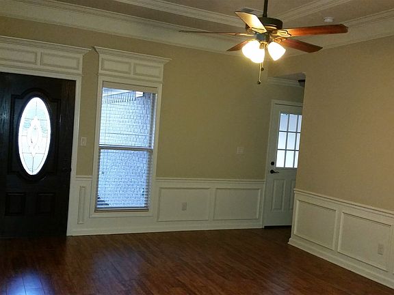 Plank tile flooring in living & bedrooms. Living & dining ar