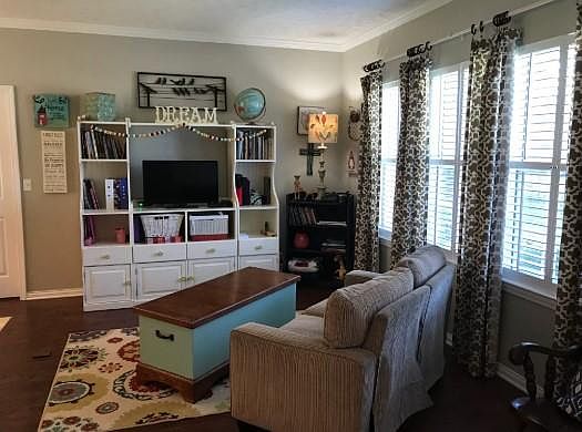 Front room when you walk in- this is shown furnished to get inspired of what it could look like. The unit does not have furniture.