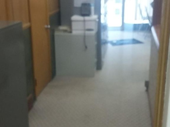 Hallway leading to rear office and side office