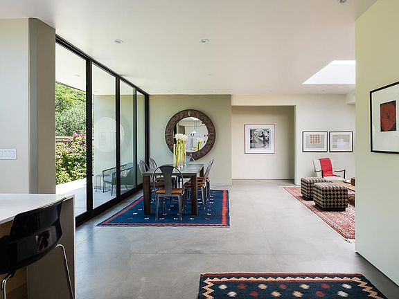 This is view from once inside front door. Floor-to-ceiling doors roll back to let the outside in.