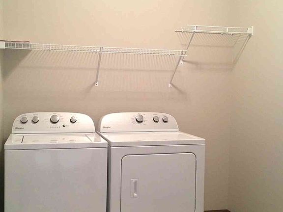Laundry and mud room attached to garage.