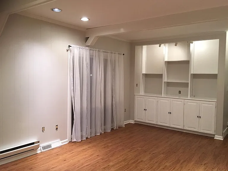 Family Room with back patio doors and built-ins.
