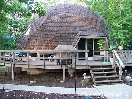 Side View Of House
						:
						Wrap around deck w/plenty of room for grill, picnic table and a great view!