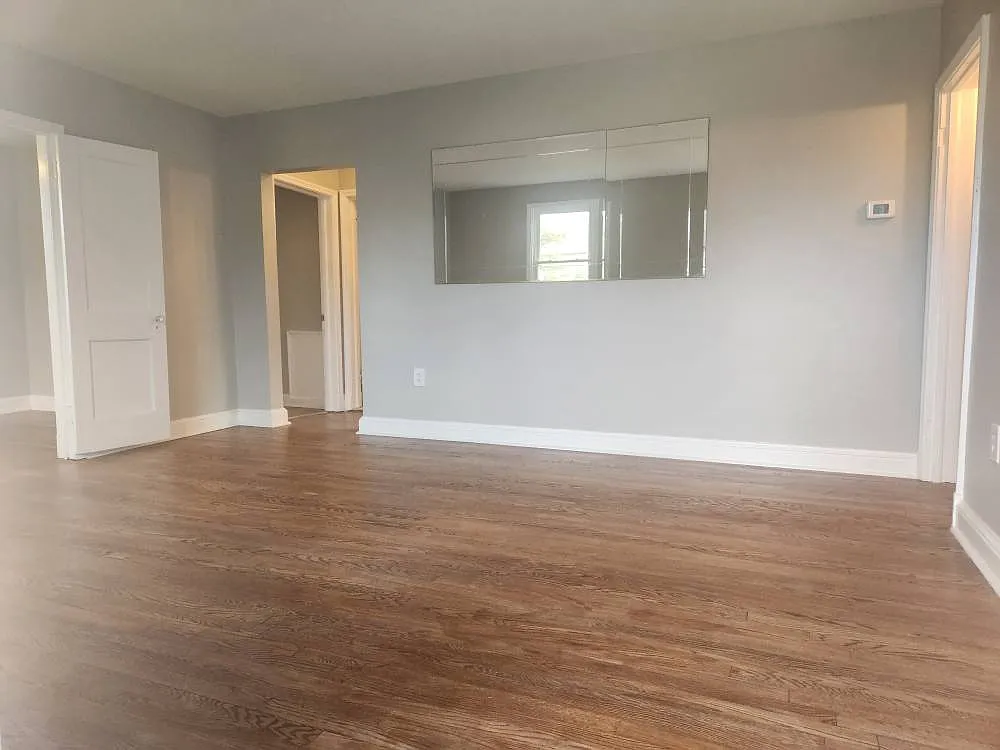 Living room, 2 bedrooms, full bath, and office/bonus room on main level. - 3303 Mary Ave #1