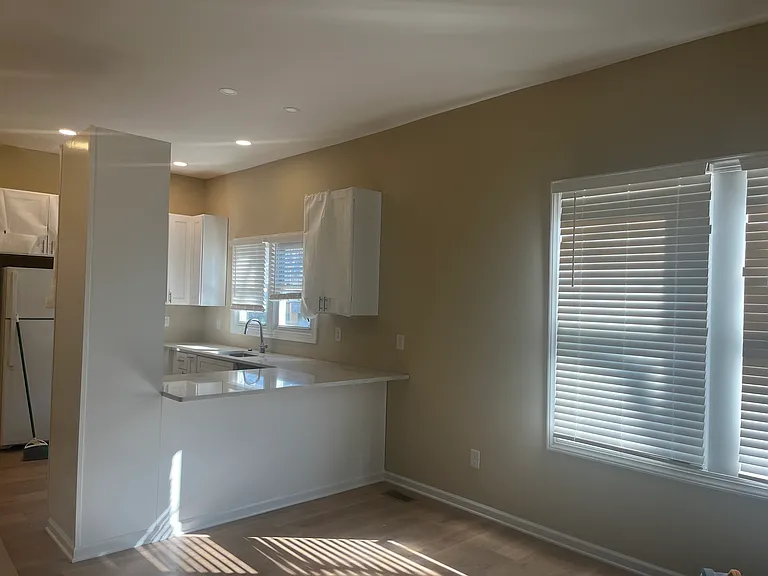 Den looking into new kitchen
