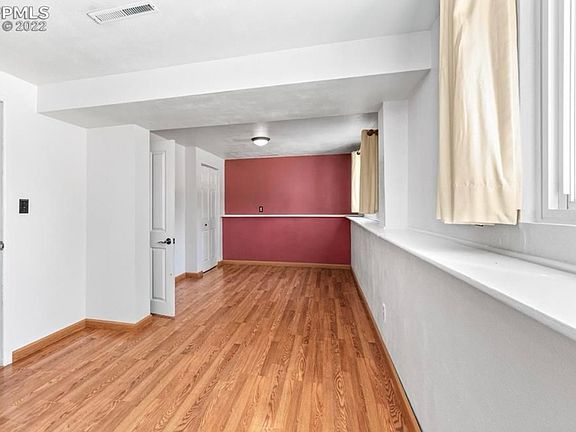 Downstairs large bedroom with walk in bathroom