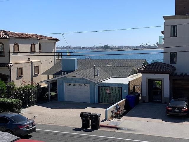 Across the street from the bay. 
Front view from balcony.