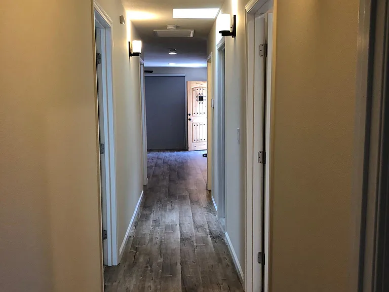 Hallway picture from back of house looking towards front door.