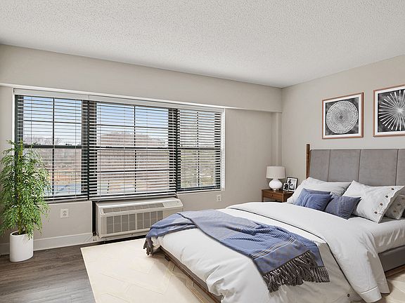 Select homes feature wood flooring in the bedroom