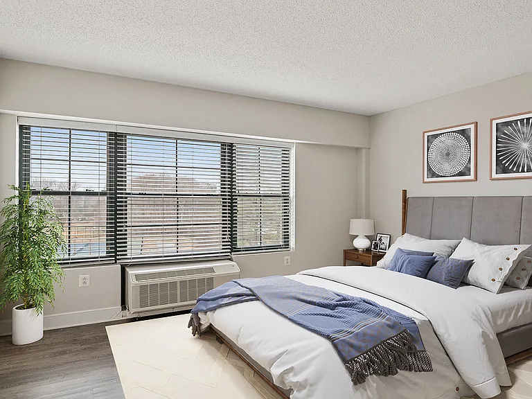 Select homes feature wood flooring in the bedroom