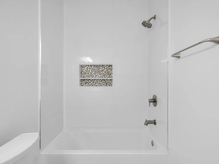 Ensuite bathroom for the main floor primary bedrooom