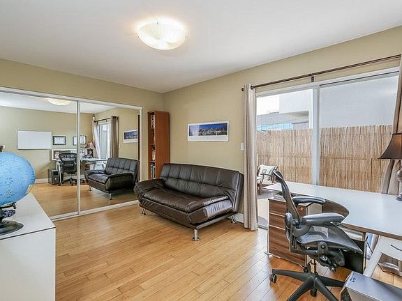 Upstairs bedroom/office with full closet & balcony